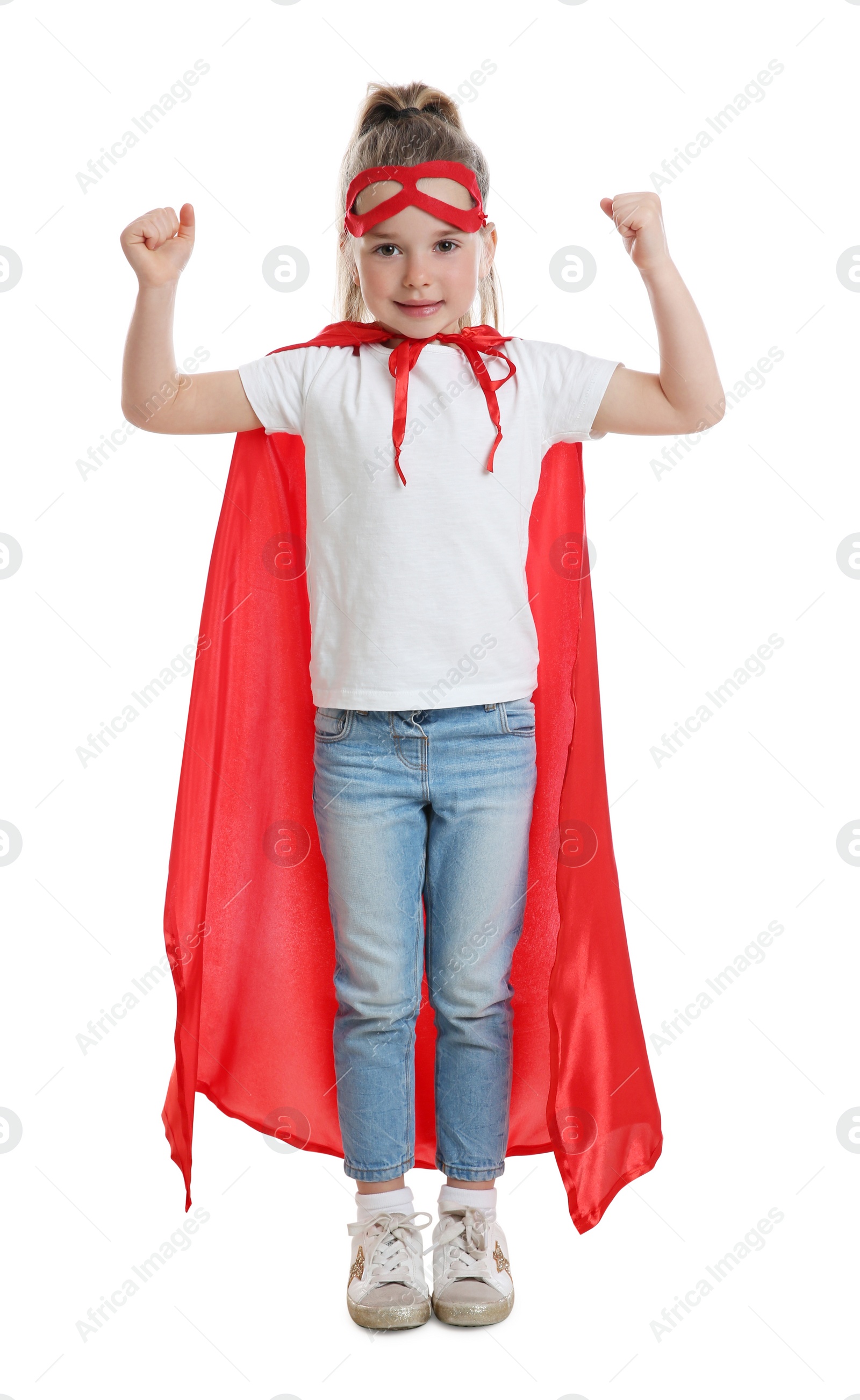 Photo of Little girl in superhero costume on white background