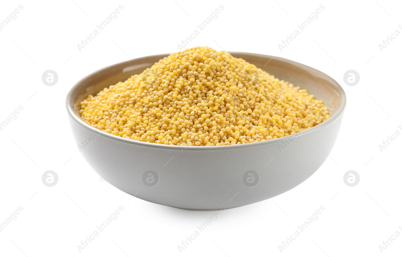 Photo of Dry millet seeds in bowl isolated on white