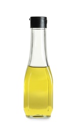 Glass bottle with fresh olive oil on white background