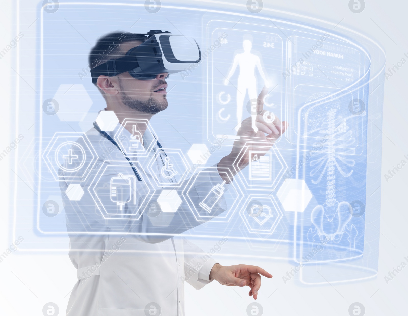 Image of Medical technology concept. Doctor using virtual reality headset to study health data of patient