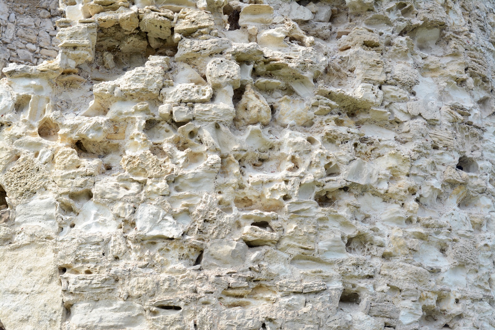 Photo of Texture of old stone wall as background