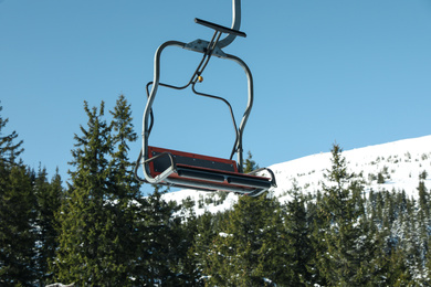 Ski lift at mountain resort. Winter vacation