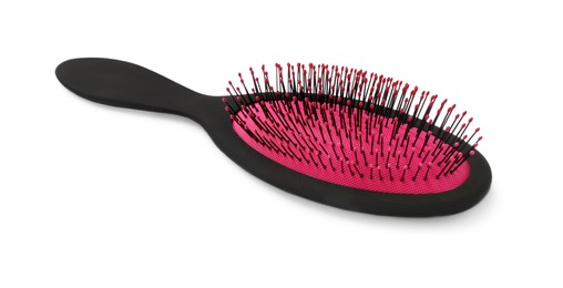 Photo of New plastic hair brush isolated on white