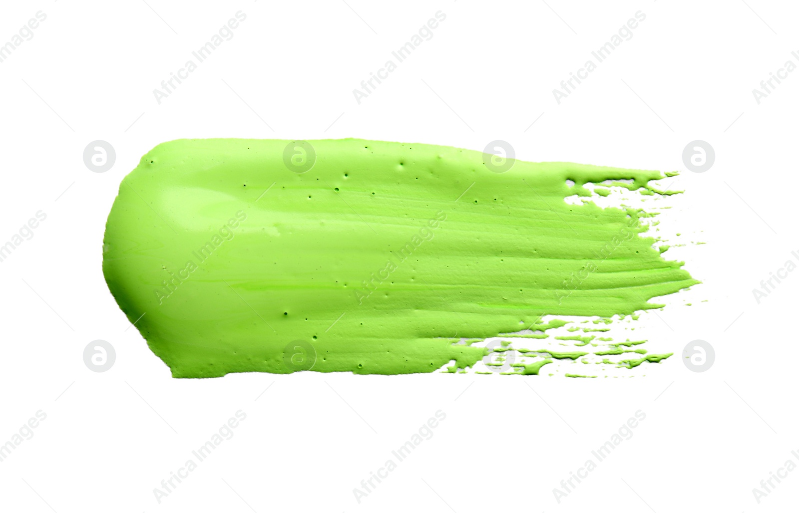 Photo of Abstract brushstroke of green paint isolated on white