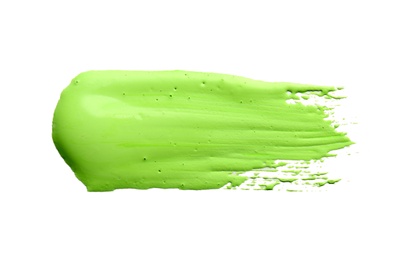 Abstract brushstroke of green paint isolated on white