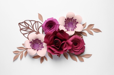 Different beautiful flowers and branches made of paper on white background, top view