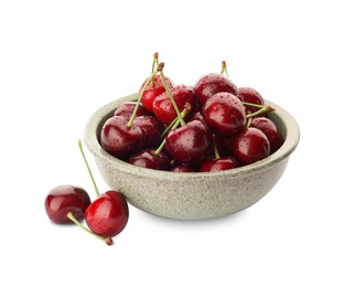 Bowl with ripe sweet cherries on white background