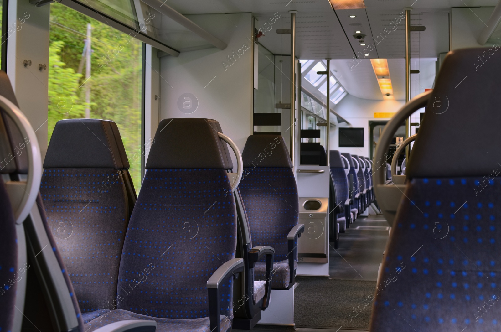 Photo of Comfortable seats in empty modern passenger train