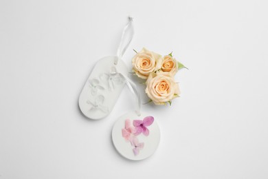 Photo of Composition with scented sachets on white background, top view