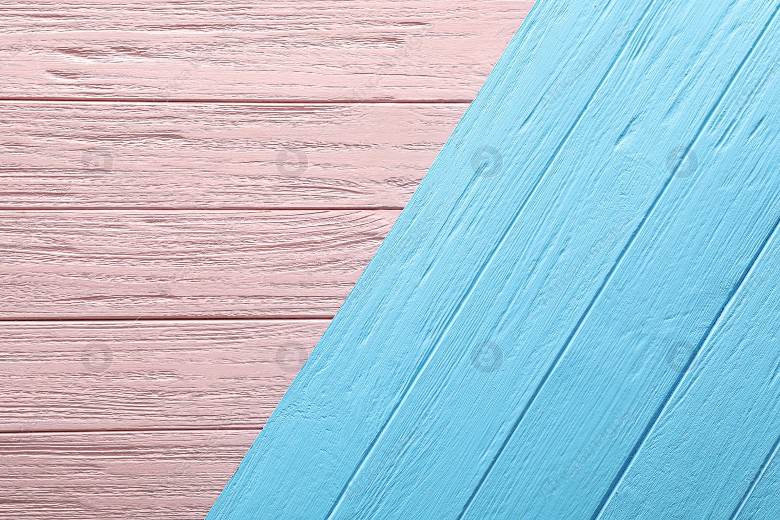 Photo of Texture of pink and light blue wooden surfaces as background, top view