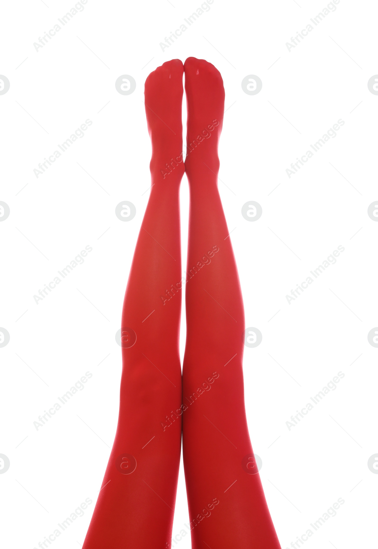 Photo of Woman wearing red tights on white background, closeup of legs