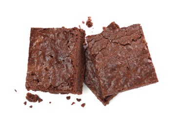 Delicious chocolate brownies on white background, top view