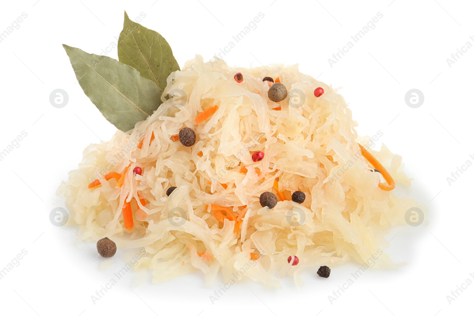 Photo of Tasty sauerkraut with carrot, peppercorns and bay leaves on white background