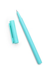 Photo of One turquoise marker and cap on white background, top view