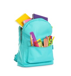 Turquoise backpack with different school supplies isolated on white