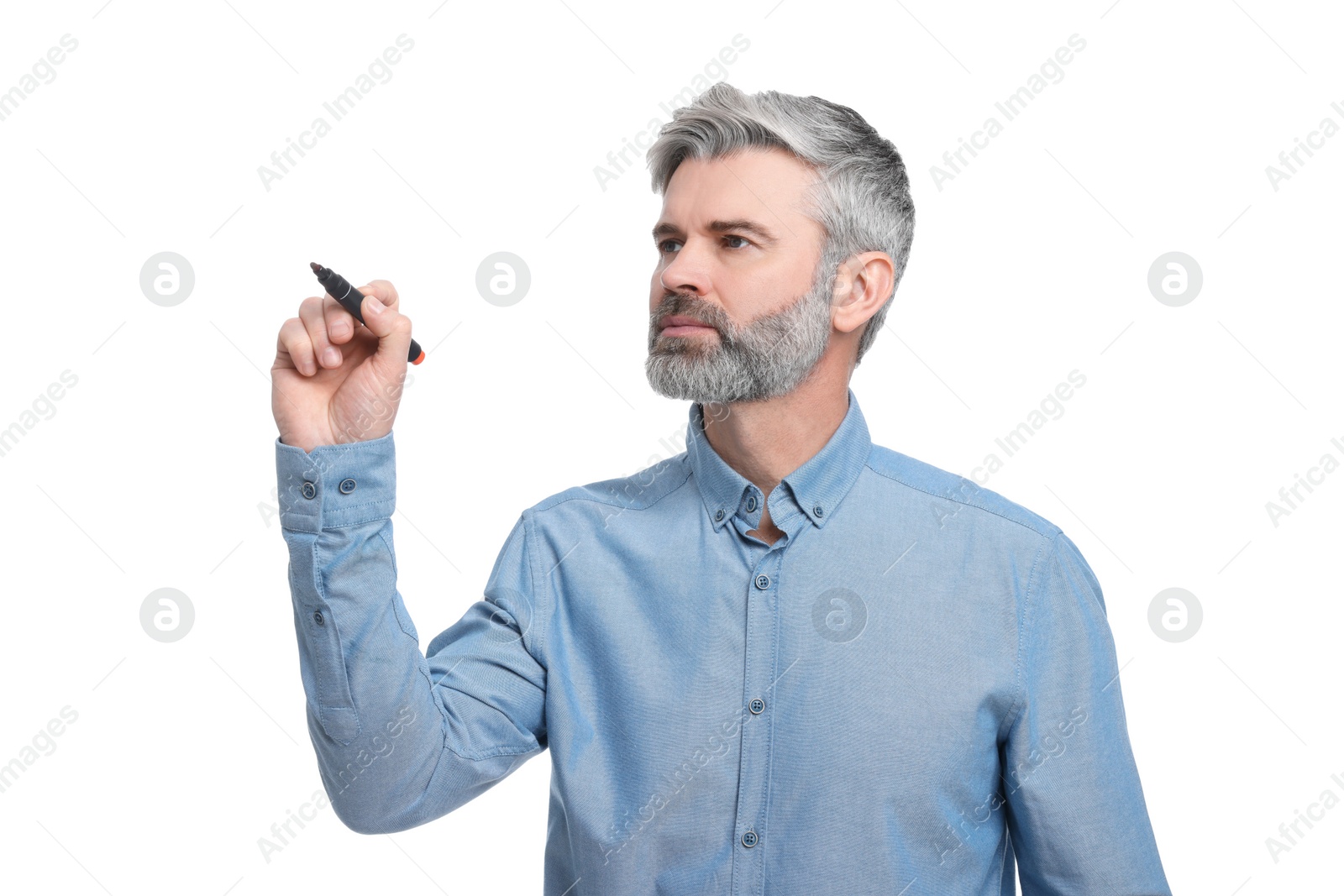 Photo of Mature businessman with marker on white background