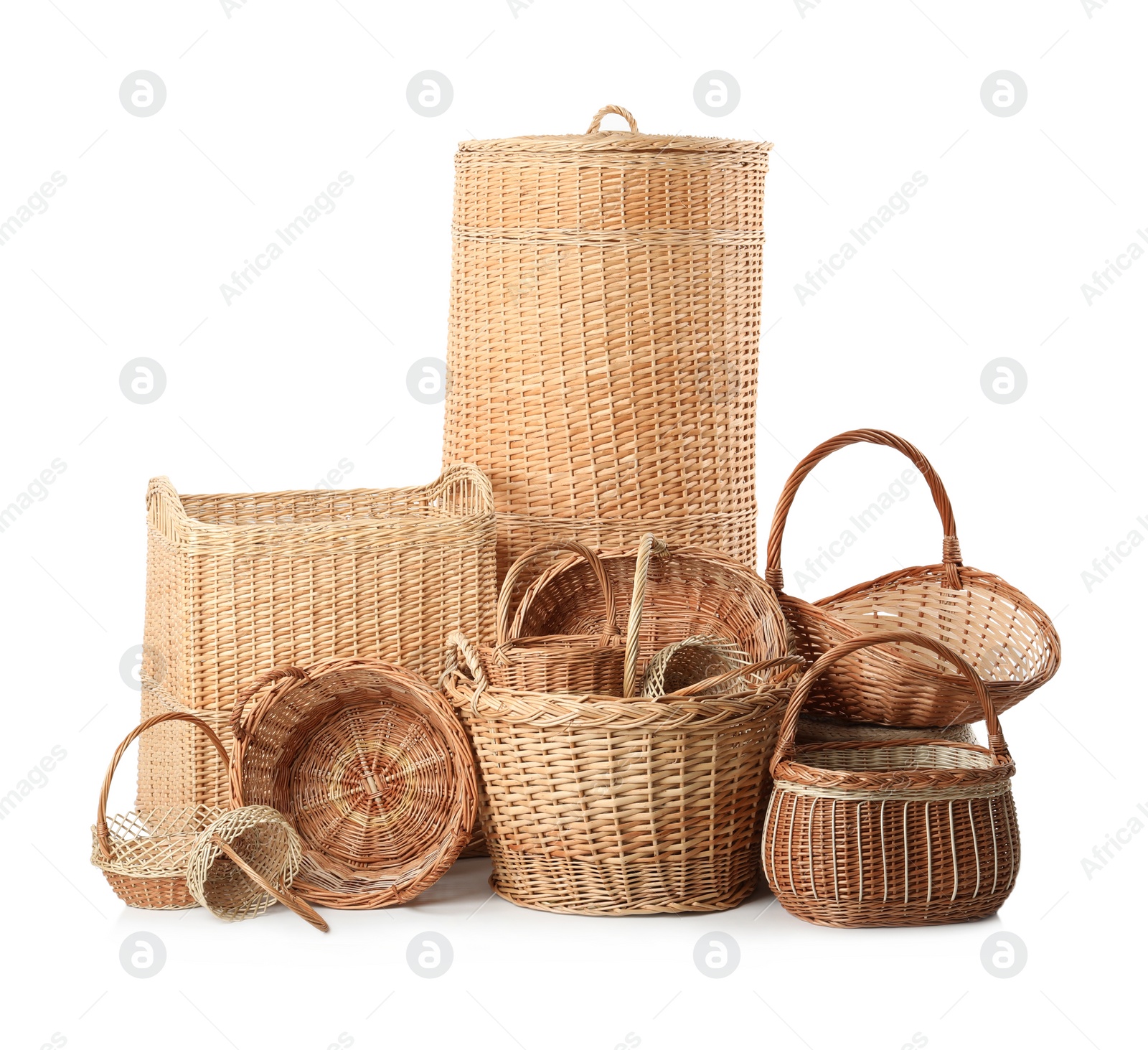 Photo of Many different wicker baskets isolated on white