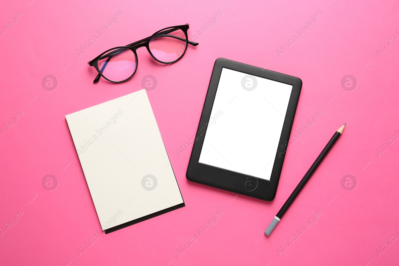 Photo of Modern e-book reader, notebook, pencil and glasses on pink background, flat lay