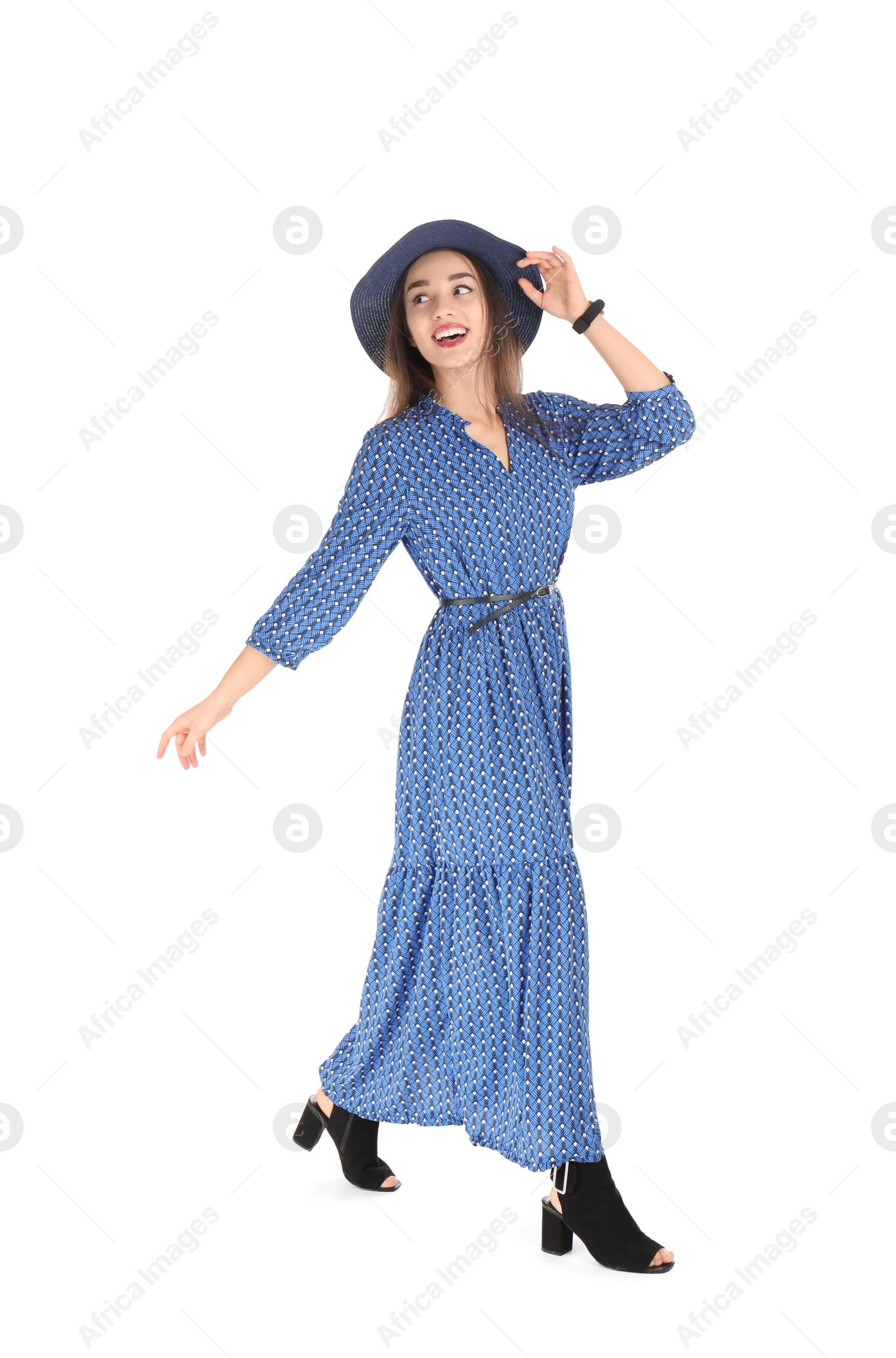 Photo of Portrait of beautiful young woman in stylish dress on white background