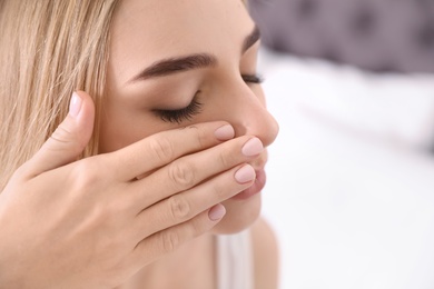 Photo of Young woman with eyelash loss problem indoors