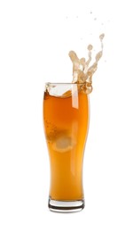 Beer splashing out of glass on white background