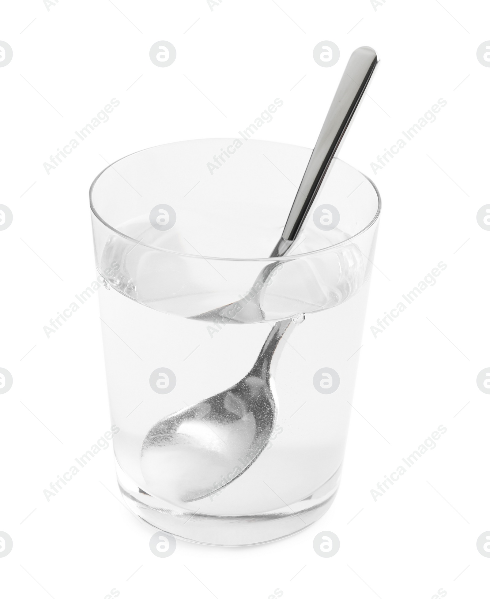 Photo of Glass of water with baking soda on light background