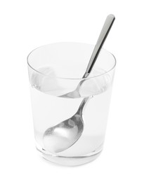 Photo of Glass of water with baking soda on light background