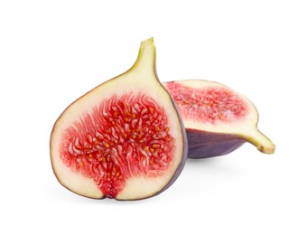 Photo of Halves of fresh fig isolated on white