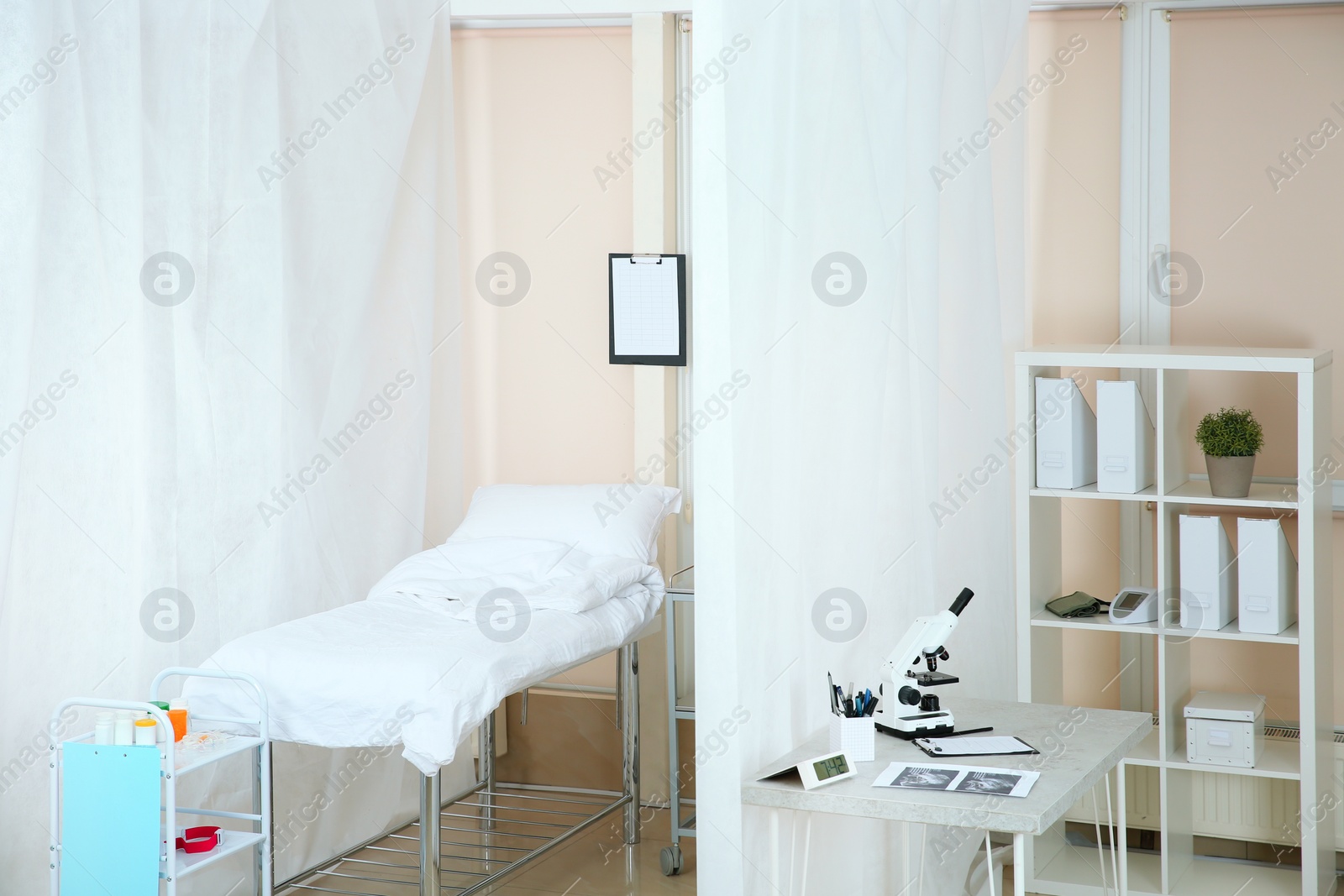 Photo of Modern interior of doctor's office with couch