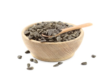 Photo of Sunflower seeds in bowl on white background