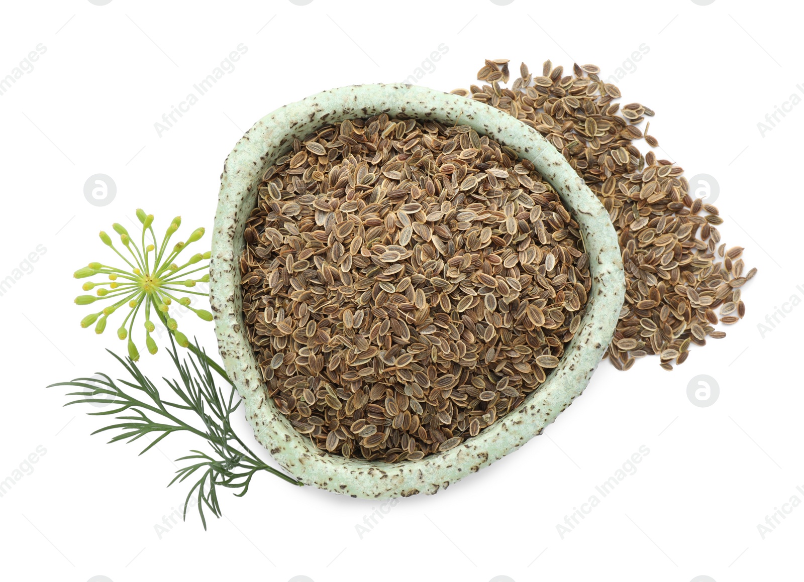 Photo of Bowl of dry seeds and fresh dill isolated on white, top view