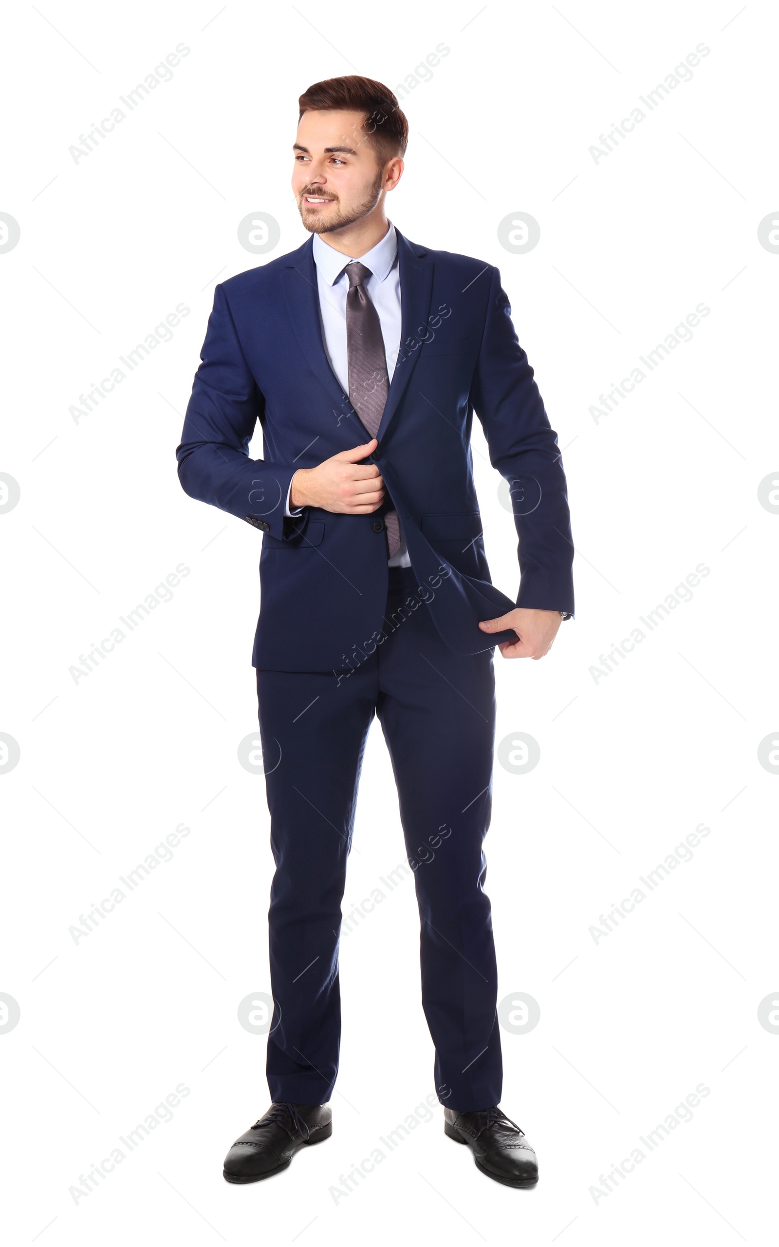 Photo of Full length portrait of businessman posing on white background