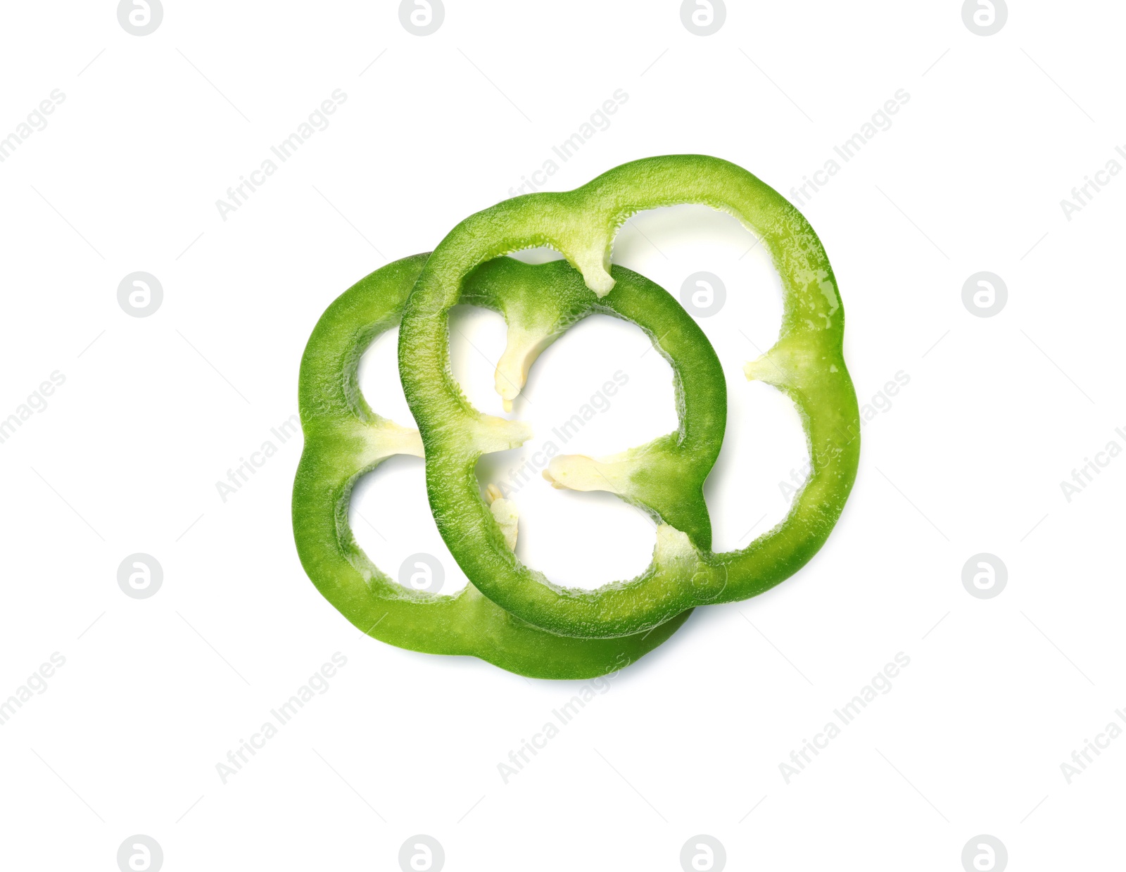 Photo of Rings of tasty green bell pepper on white background, top view