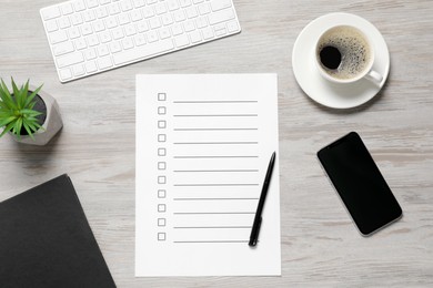 Paper sheet with checkboxes, cup of coffee, smartphone and computer keyboard on white wooden table, flat lay. Checklist