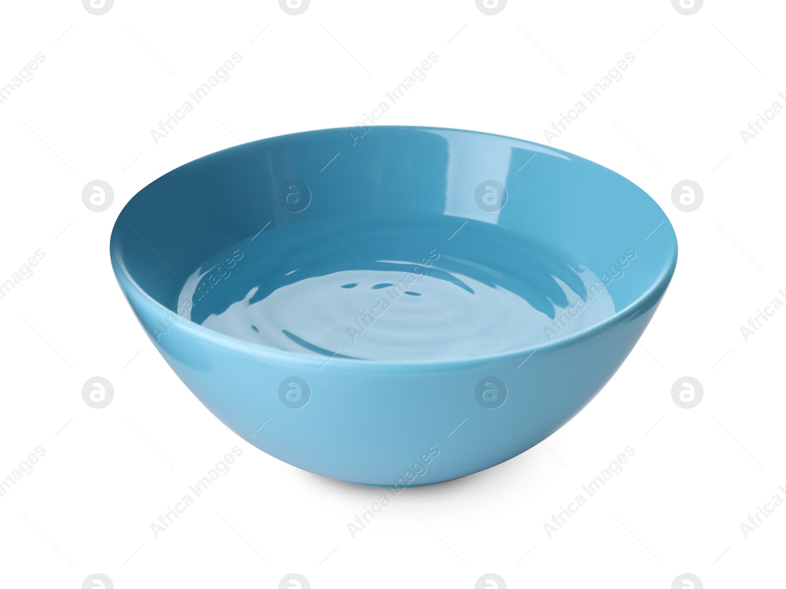 Photo of Blue ceramic bowl with clear water isolated on white