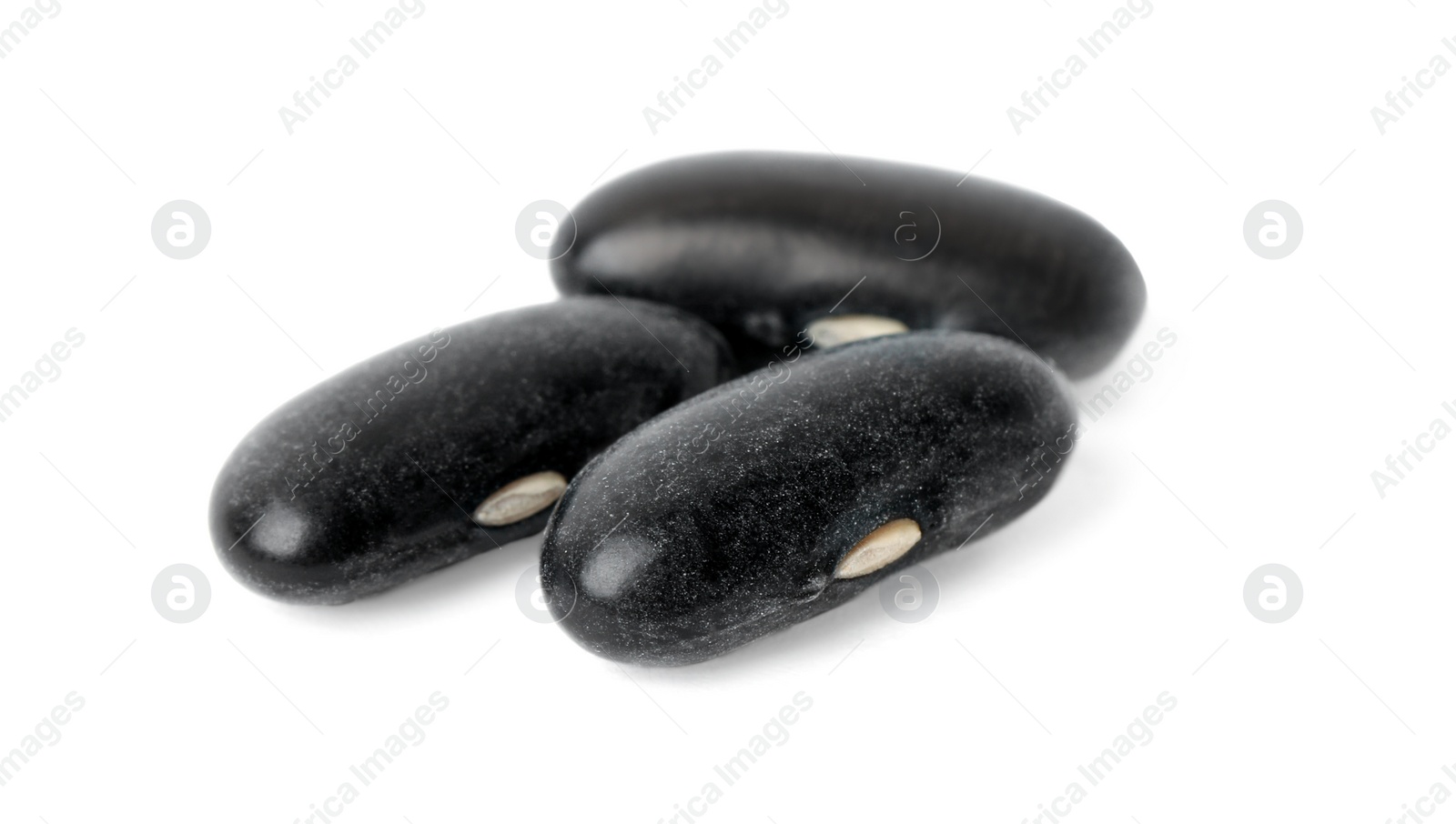 Photo of Pile of raw black beans on white background. Vegetable planting