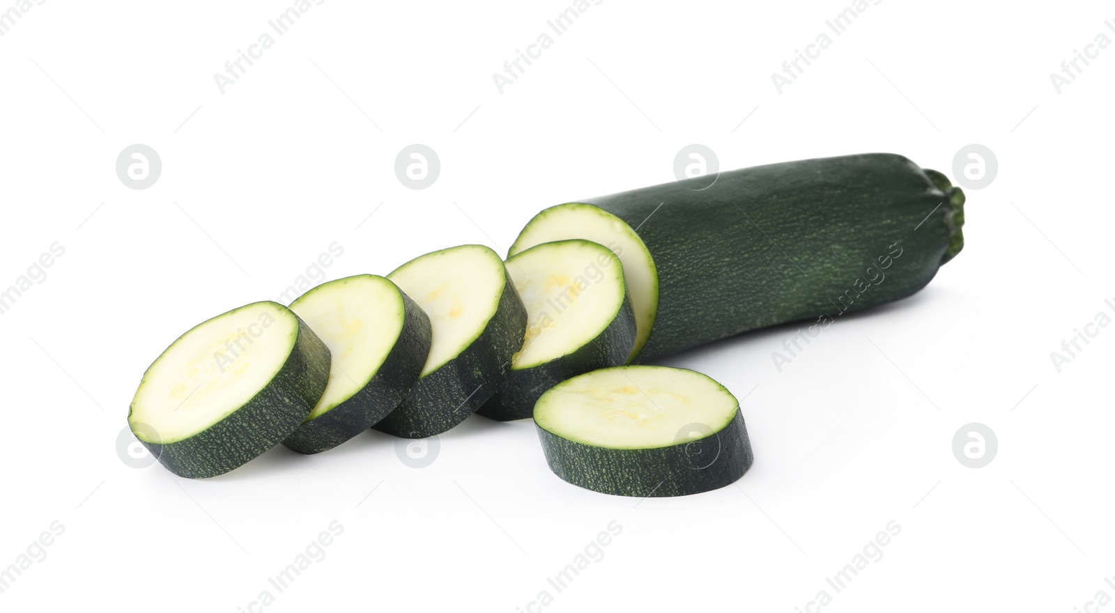 Photo of Cut green ripe zucchini isolated on white