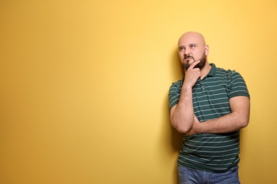 Photo of Portrait of young man on color background