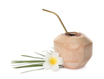 Photo of Young peeled coconut with straw, palm leaf and beautiful flower isolated on white