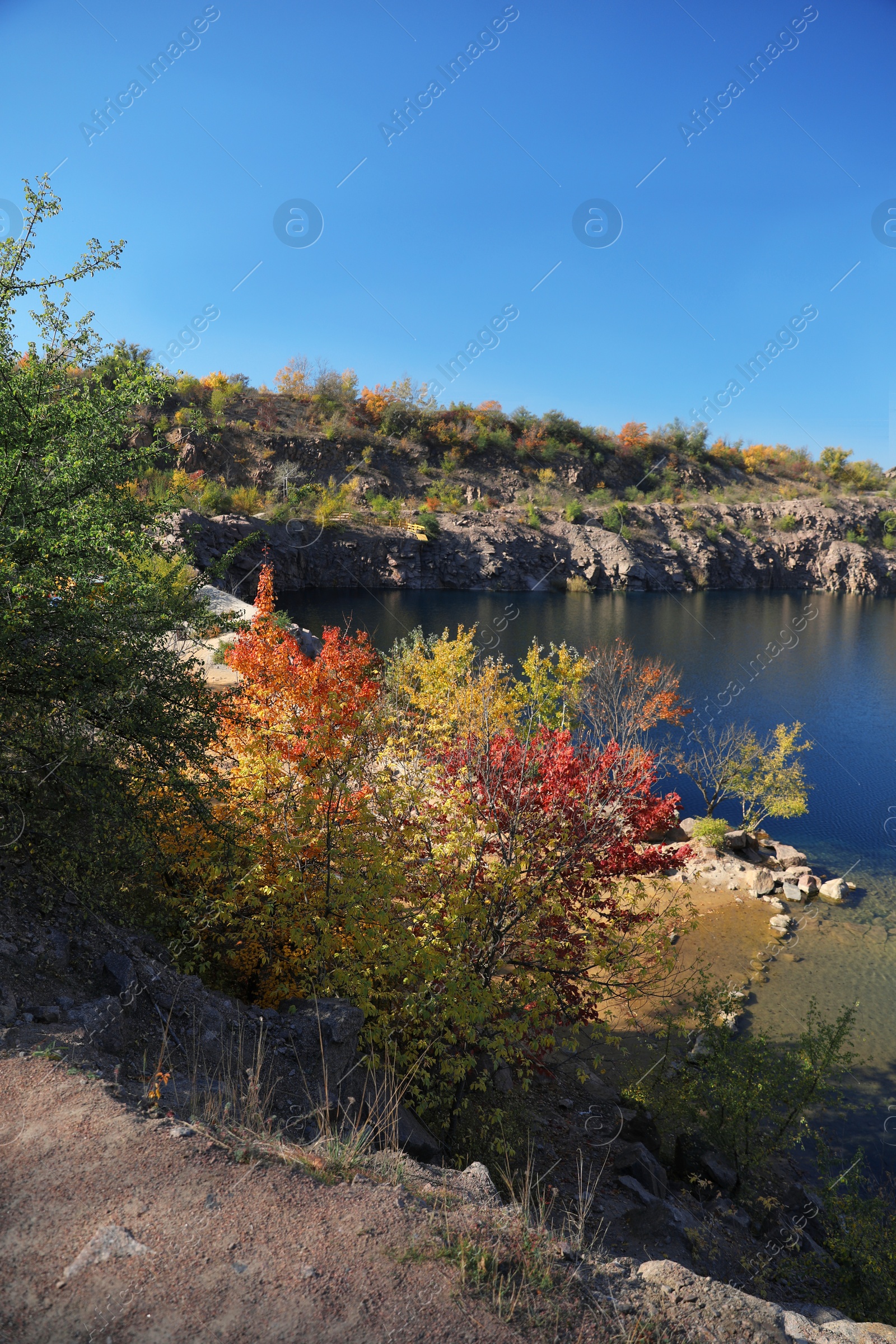 Photo of Picturesque view of beautiful lake surrounded by rocky hills