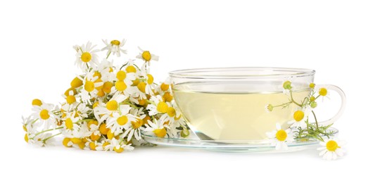 Aromatic herbal tea in glass cup with chamomile flowers isolated on white