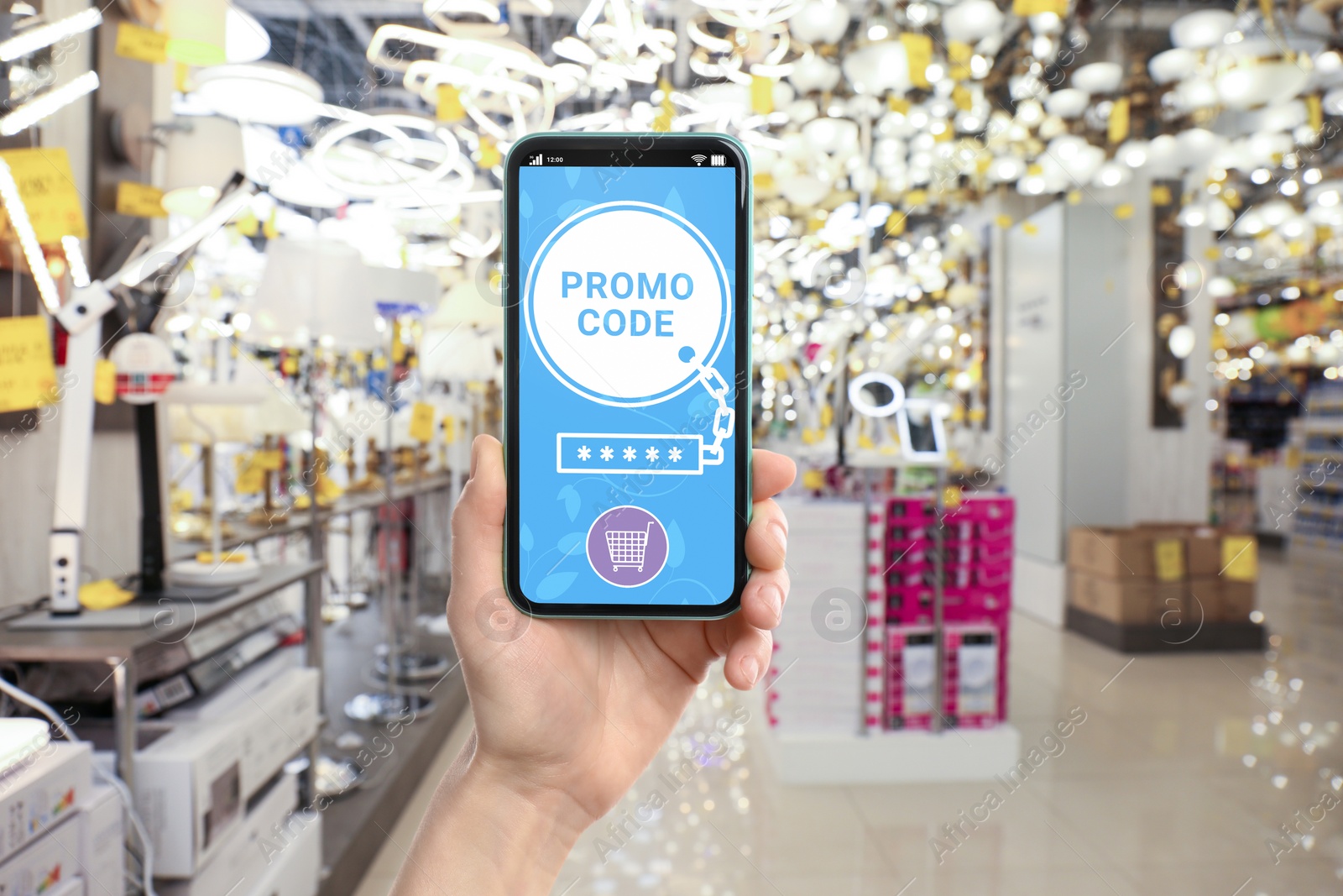 Image of Woman holding smartphone with activated promo code in shopping mall, closeup