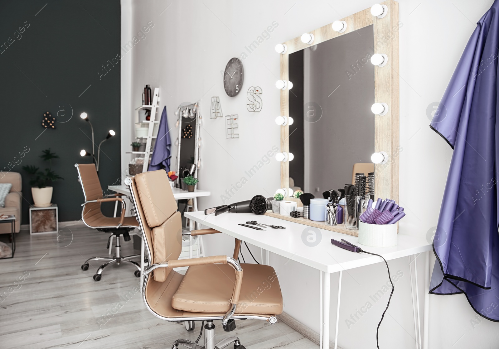 Photo of Stylish hairdressing salon interior