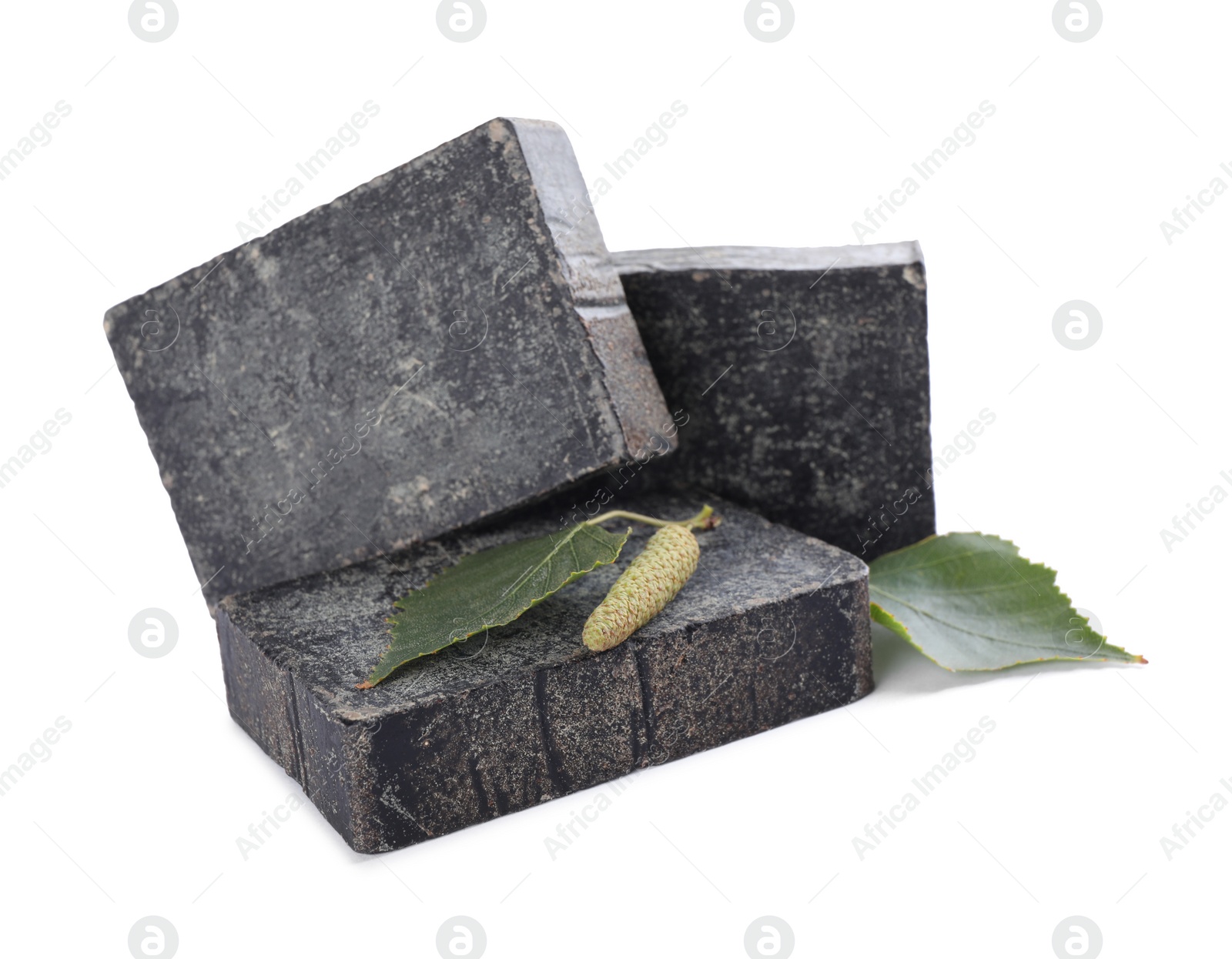 Photo of Tar soap bars isolated on white. Natural product