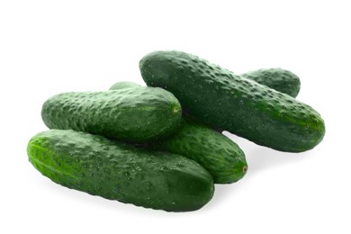 Photo of Whole fresh green cucumbers on white background