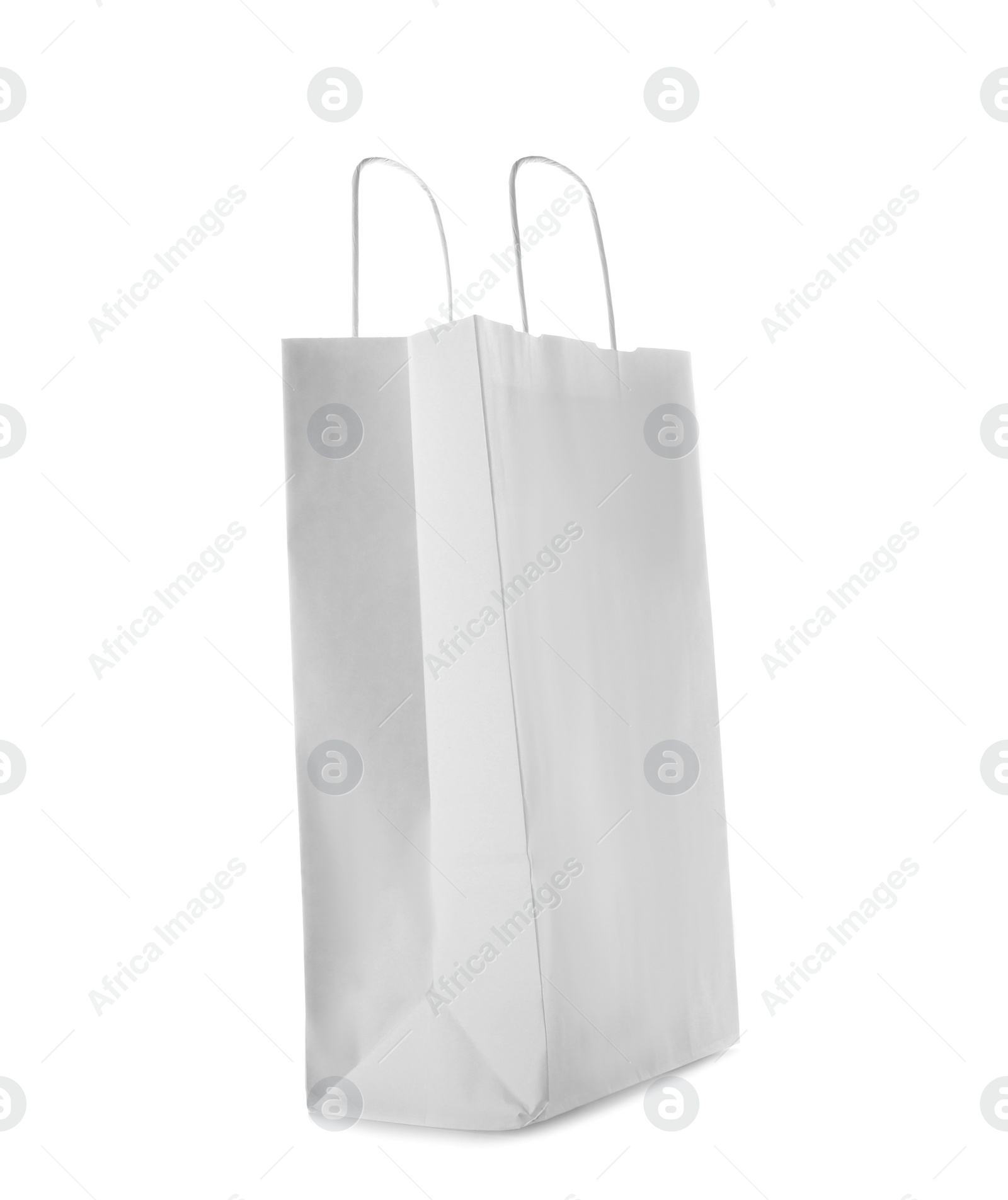 Photo of Mockup of paper shopping bag on white background