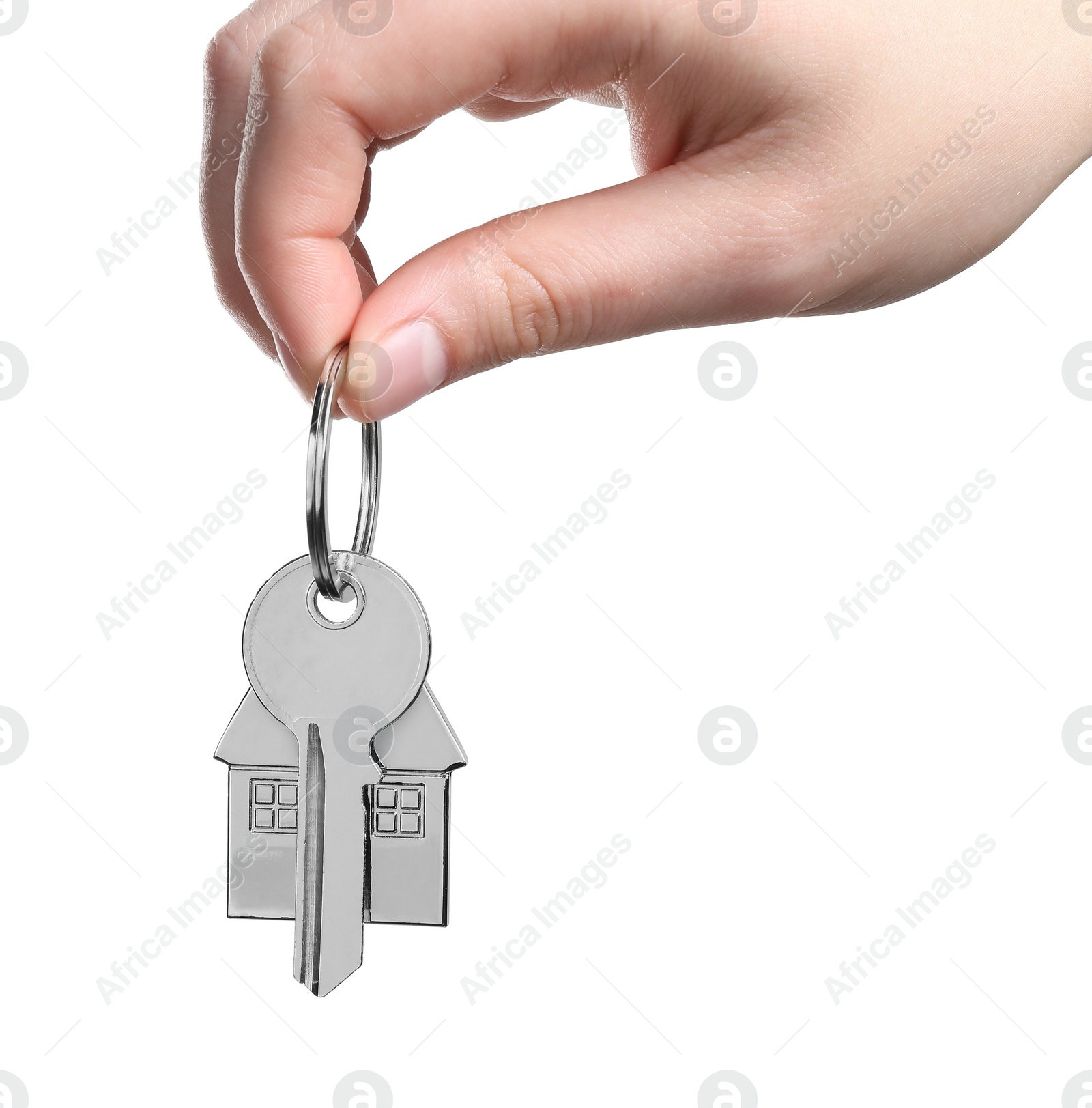 Photo of Woman holding key with keychain in shape of house isolated on white, closeup