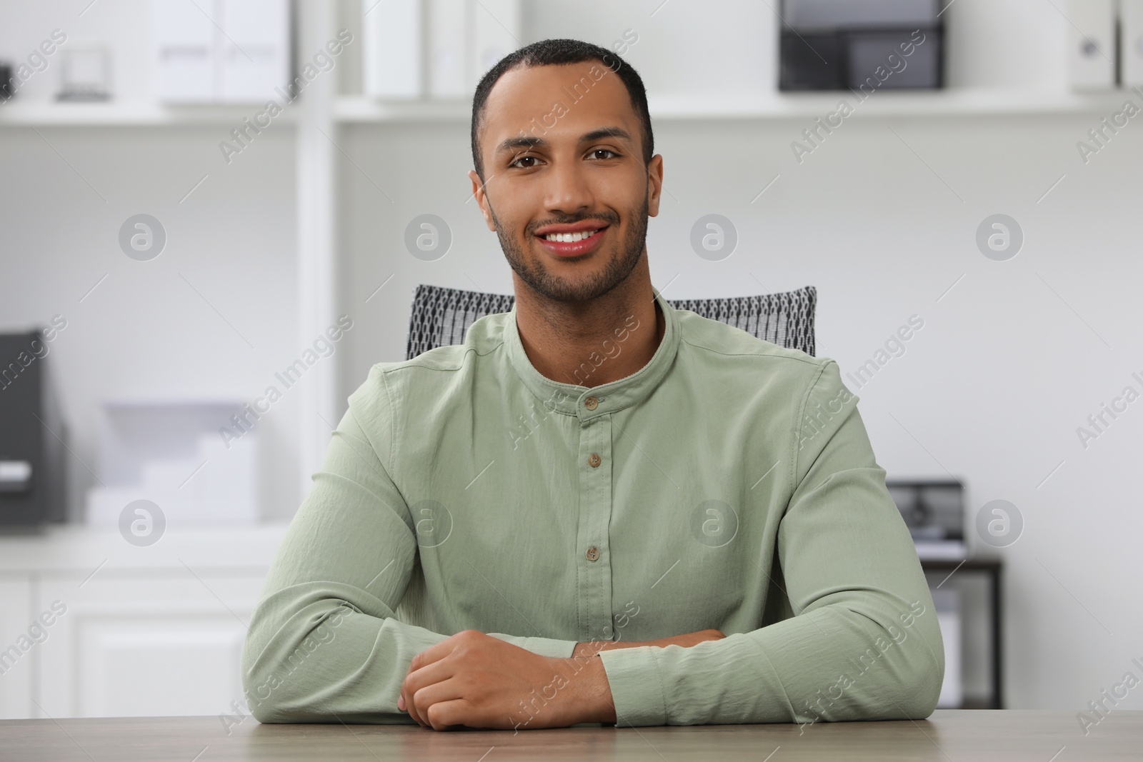 Photo of Portrait of handsome young man at home