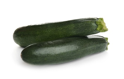 Fresh ripe green zucchinis isolated on white