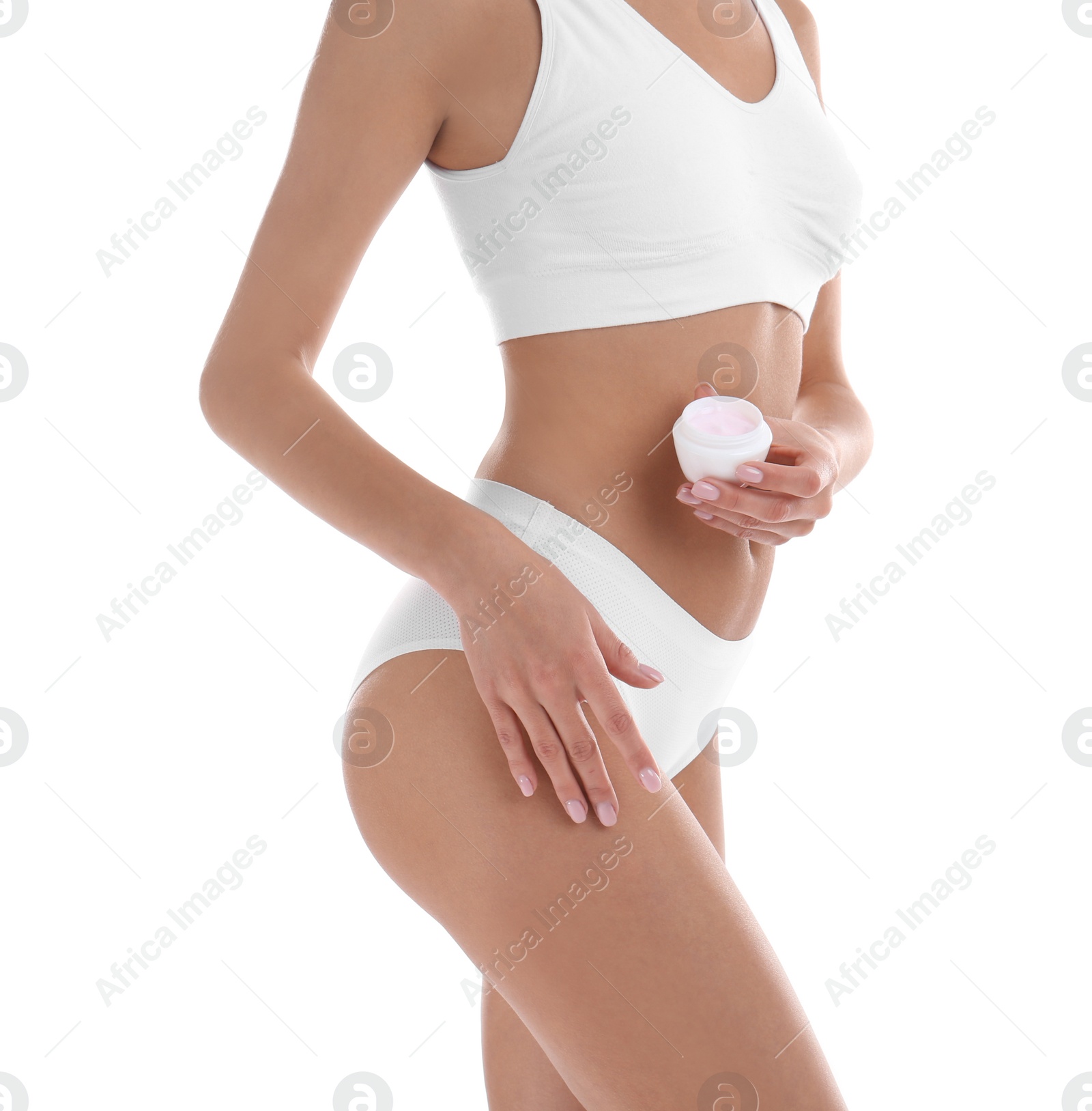 Photo of Young woman with jar of cream on white background. Beauty and body care